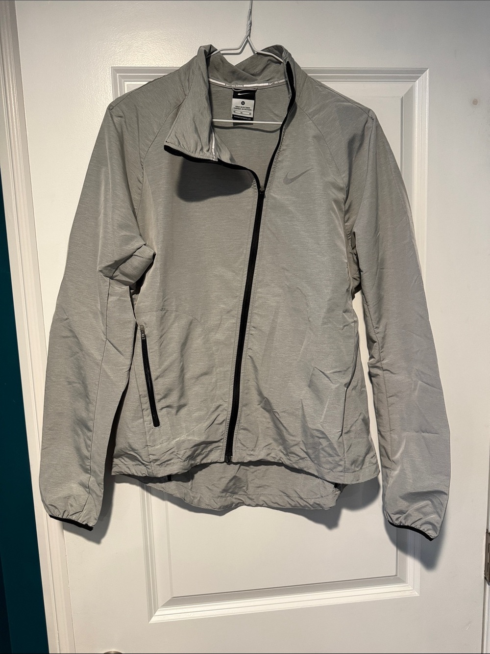 Nike Women’s Light Gray Training Jacket with Asymmetric Zipper
